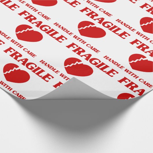 Fragile hartbehandeling met zorg cadeaupapier (Hoek)