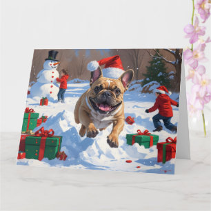 Franse Bulldog loopt in de sneeuw met kerstmuts Kaart