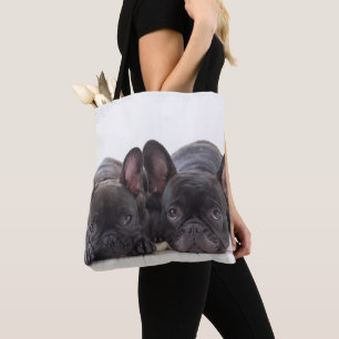 Franse bulledogs die op een mand springen tote bag