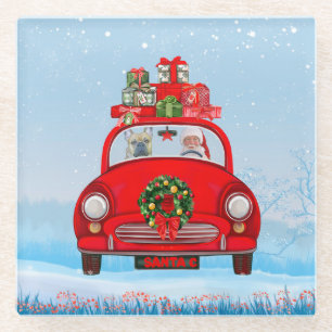 Franse bullehond in auto met kerstman glazen onderzetter