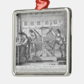 Franse drukpers, 1642 metalen ornament (Links)