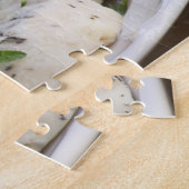 Franse geitenkaas - chevre - met kruiden op een legpuzzel (Zijkant)