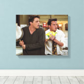 FRIENDS™ | Joey & Chandler Scared Canvas Afdruk (Insitu (Houten vloer))