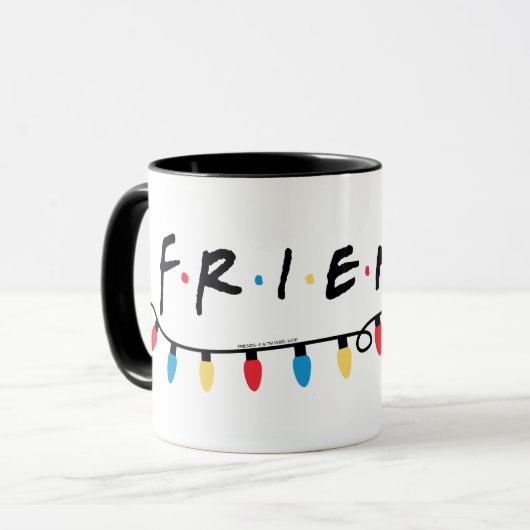 FRIENDS™ | Logo met kerstlampjes Mok (Voorkant links)