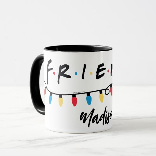 FRIENDS™ | Logo met kerstlampjes Mok (Voorkant links)