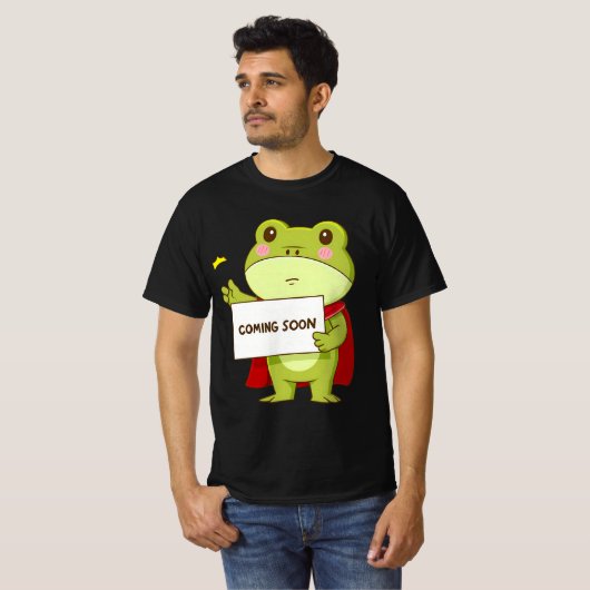 Frog Coming Soon - Kikker met Cape Holding komt er T-shirt (Voorkant volledig)