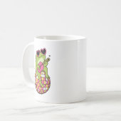 Frog sitting on dance ball playing guitar koffiemok (Voorkant links)