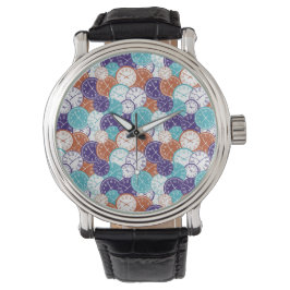 Front and back of a wristwatch with a colorful horloge