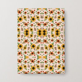 Front and back views of a floral-patterned  button