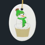Frosty Snowman Cupcake Keramisch Ornament<br><div class="desc">Een schattige snowman kast met witte vorst en groen pet en sjaal. Een schattig kerstbakje met het ornament.</div>