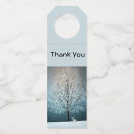 Frosty tree in de avond flessenhanger