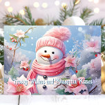 Frosty Wishes en Poinsettia kussen Snowman Feestdagen Kaart<br><div class="desc">Stuur warme feestelijke groeten met deze charmante kaart met een vrolijke sneeuwman gebundeld in een roze sjaal,  omringd door mooie roze poinsettia's. De zoete boodschap "Frosty Wishes and Poinsettia Kisses" voegt een grillige en feestelijke touch toe,  perfect voor het verspreiden van vreugde aan vrienden en familie dit kerstseizoen.</div>