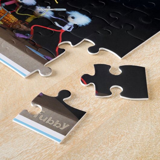 Fubby die slagbal spelen met mais/popcorn. legpuzzel (Zijkant)