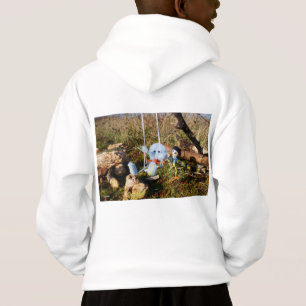 Fubby monster op de schommel.