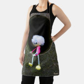 Fubby poppetje dat in een muur zit. schort (Insitu)