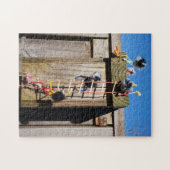 Fubby's die een vogelhuis beklimmen. legpuzzel (Horizontaal)