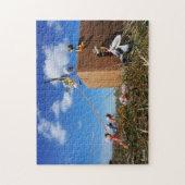 Fubby's die spelen met veren en vliegen. legpuzzel (Verticaal)