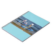 Fubby's op peddelboard dat een teenslipper is. notitieboek (Linkerzijde)