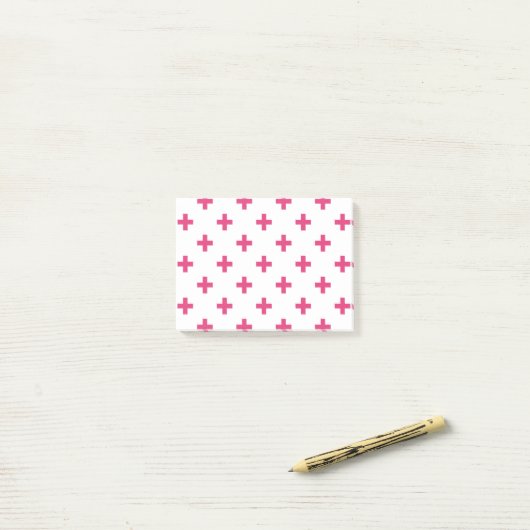 Fuchsia polka kruist wit post-it® notes (Op bureau)