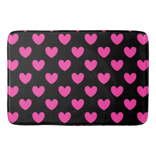 Fuchsia roze polka harten op zwart badmat (Voorkant)