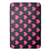 Fuchsia roze polka harten op zwart badmat (Voorkant Verticaal)