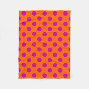 Fuchsia stippen op oranje fleece deken