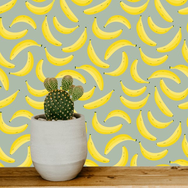 Fun banaan geel salie groen behang (Banana fun fruity pattern on soft sage green art wallpaper)