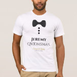Fun Groomsman Black Stropdas Wedding T-shirt<br><div class="desc">Deze leuke t-shirts zijn ontworpen als gunsten of cadeautjes voor trouwgroomsmen. Het t-shirt is wit en heeft een afbeelding van een zwart boegachtig stropdas en drie knoppen. De tekst leest Groomsman en heeft een plek om de naam van de bruidsman in te voeren, evenals de naam van het bruiloft en...</div>