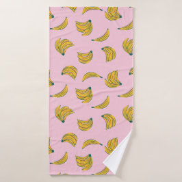 Funky banaan illustraties in geel over roze badhanddoek