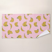 Funky banaan illustraties in geel over roze badhanddoek (Badhanddoek)
