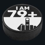 Funny 80th Birthday Gift, 79 plus één Hockey Puck<br><div class="desc">Een 79 Plus One Hockey Puck zou een uniek en humoristisch cadeau zijn voor iemand die 80 jaar oud wordt. Het "79 plus één"-ontwerp van de peddel speelt op de leeftijd van de verjaardagspersoon, met het schaakbordpatroon dat een leuk en speels element toevoegt. De 79 Plus One Checker Pickleball Paddle...</div>