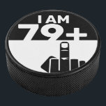 Funny 80th Birthday Gift, 79 plus één Hockey Puck<br><div class="desc">Een 79 Plus One Hockey Puck zou een uniek en humoristisch cadeau zijn voor iemand die 80 jaar oud wordt. Het "79 plus één"-ontwerp van de peddel speelt op de leeftijd van de verjaardagspersoon, met het schaakbordpatroon dat een leuk en speels element toevoegt. De 79 Plus One Checker Pickleball Paddle...</div>
