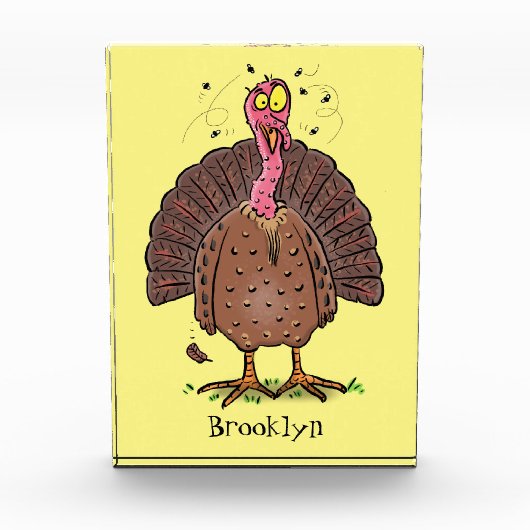 Funny brown farmyard turkey met vliegende cartoon fotoblokken (Voorkant)