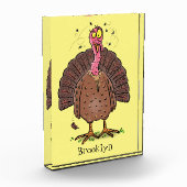Funny brown farmyard turkey met vliegende cartoon fotoblokken (Links)