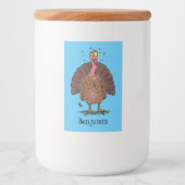 Funny brown farmyard turkey met vliegende cartoon voedselcontainer etiket (Voorkant)