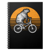 Funny Capybara Riding Bike Retro Capibara Bicycle Notitieboek (Voorkant)