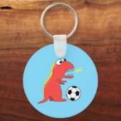 Funny Cartoon Dinosaur die voetbal speelt Sleutelhanger (Voorkant)
