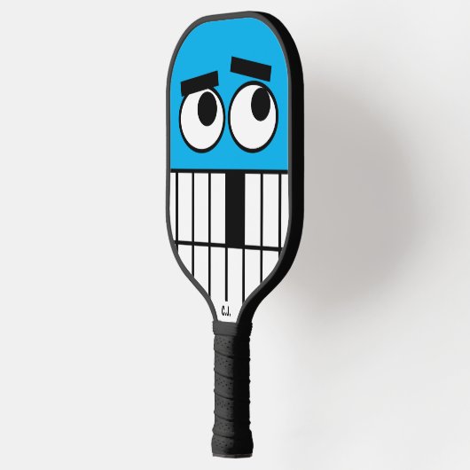Funny cartoon face pickleball paddle met initialen (Links)
