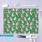 Funny Cartoon Snowmen kerstpatroop over groen Tissuepapier (Craft)