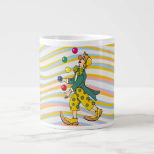 Funny Clown die speelt met kleurrijke balls Grote Koffiekop