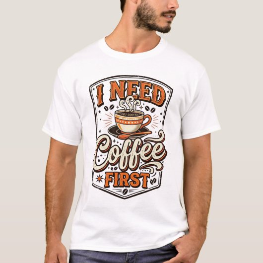 Funny Coffee Lover T-Shirt – “I Need Coffee First” (Voorkant)