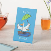 Funny eend met paraplu dansende cartoon reclamebord met voetstuk (Insitu)