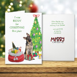 Funny German Shepherd Ready for Kerstmis Feestdagen Kaart<br><div class="desc">De Duitse herderhond op de voorkant van deze kaart zegt dat hij dit jaar klaar was voor Kerstmis. Hij zit voor een versierde vakantieboom, met een kerstzak geschenken naast hem. Eén cadeau is al tussen zijn poten. Het sentiment wordt van binnenuit voortgezet en zou een glimlach moeten zijn voor de...</div>