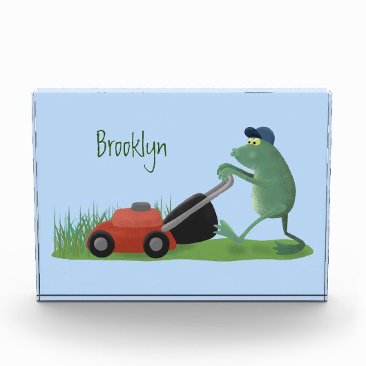 Funny green frog mowing grawn cartoon fotoblokken (Voorkant)