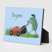 Funny green frog mowing grawn cartoon fotoplaat (Zijkant)