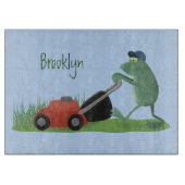 Funny green frog mowing grawn cartoon snijplank (Voorkant)
