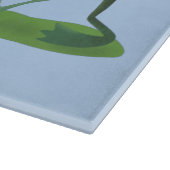 Funny green frog mowing grawn cartoon snijplank (Hoek)