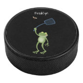 Funny green frog swatting fly cartoon hockey puck (3/4)
