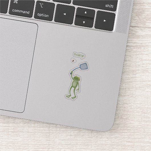 Funny green frog swatting fly cartoon sticker (Detail)