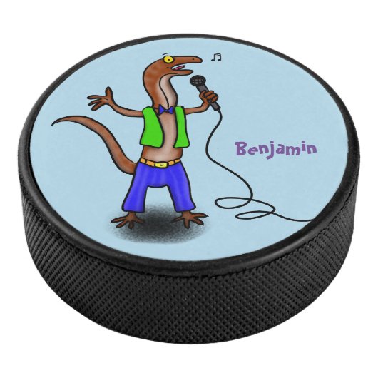 Funny lizard zingt met cartoon van de microfoon hockey puck (3/4)